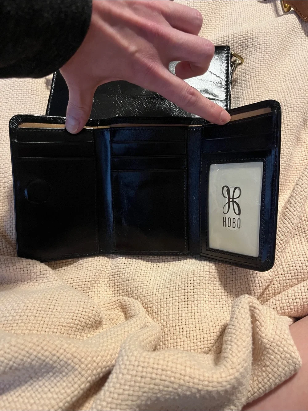 HOBO Black Leather Crossbody Wallet with Gold Logo Accent